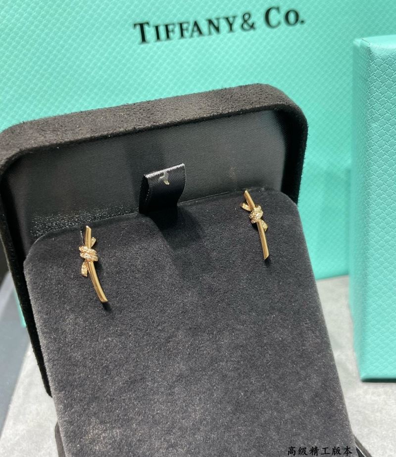 T*f*ny earrings
